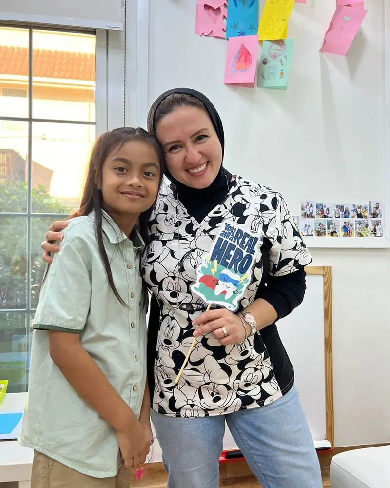 Dr Mai Kamar, Pediatric Dentist with Happy Patients